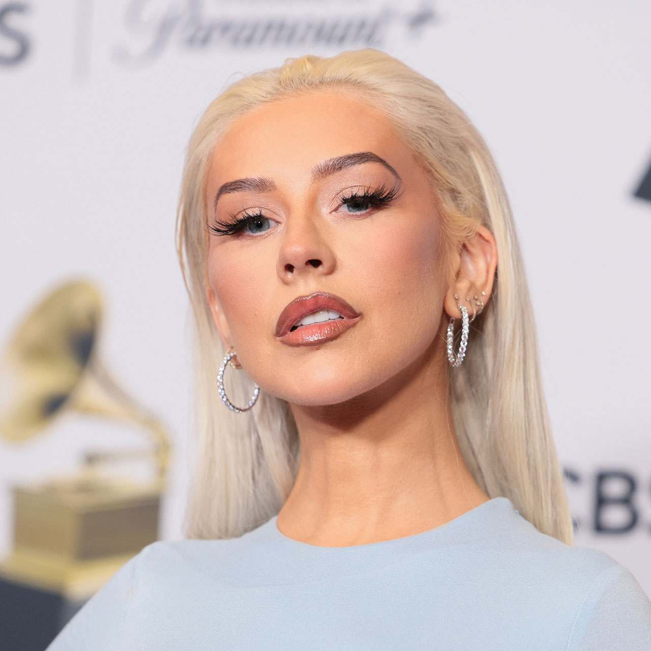 Christina-Aguilera-poses-in-the-press-room-during-the-66th-annual-Grammy-Awards.jpg