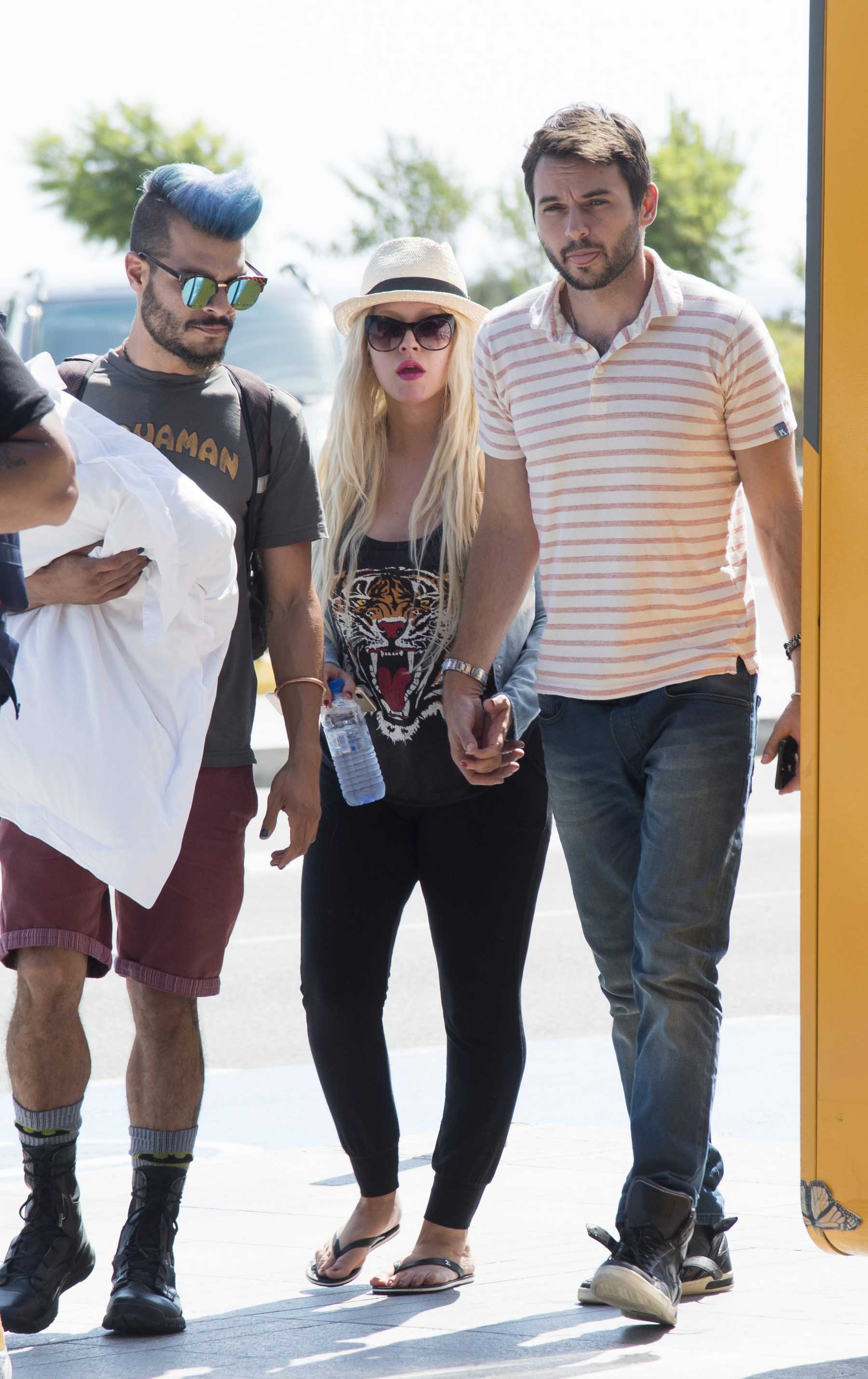 Christina_Aguilera_-_At_Paphos_Airport_in_Cyprus_on_September_7-03.jpg