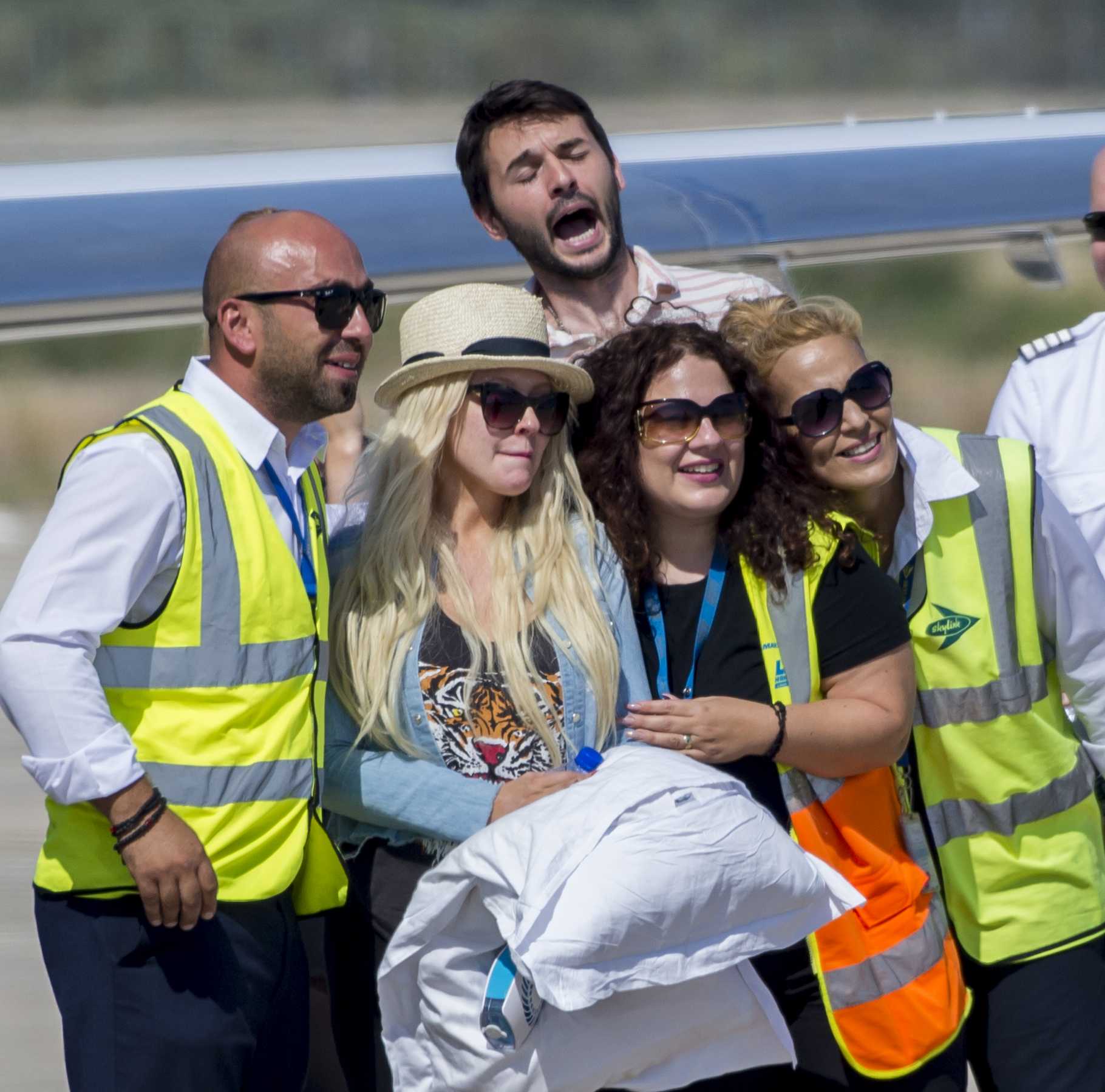 Christina_Aguilera_-_At_Paphos_Airport_in_Cyprus_on_September_7-12.jpg