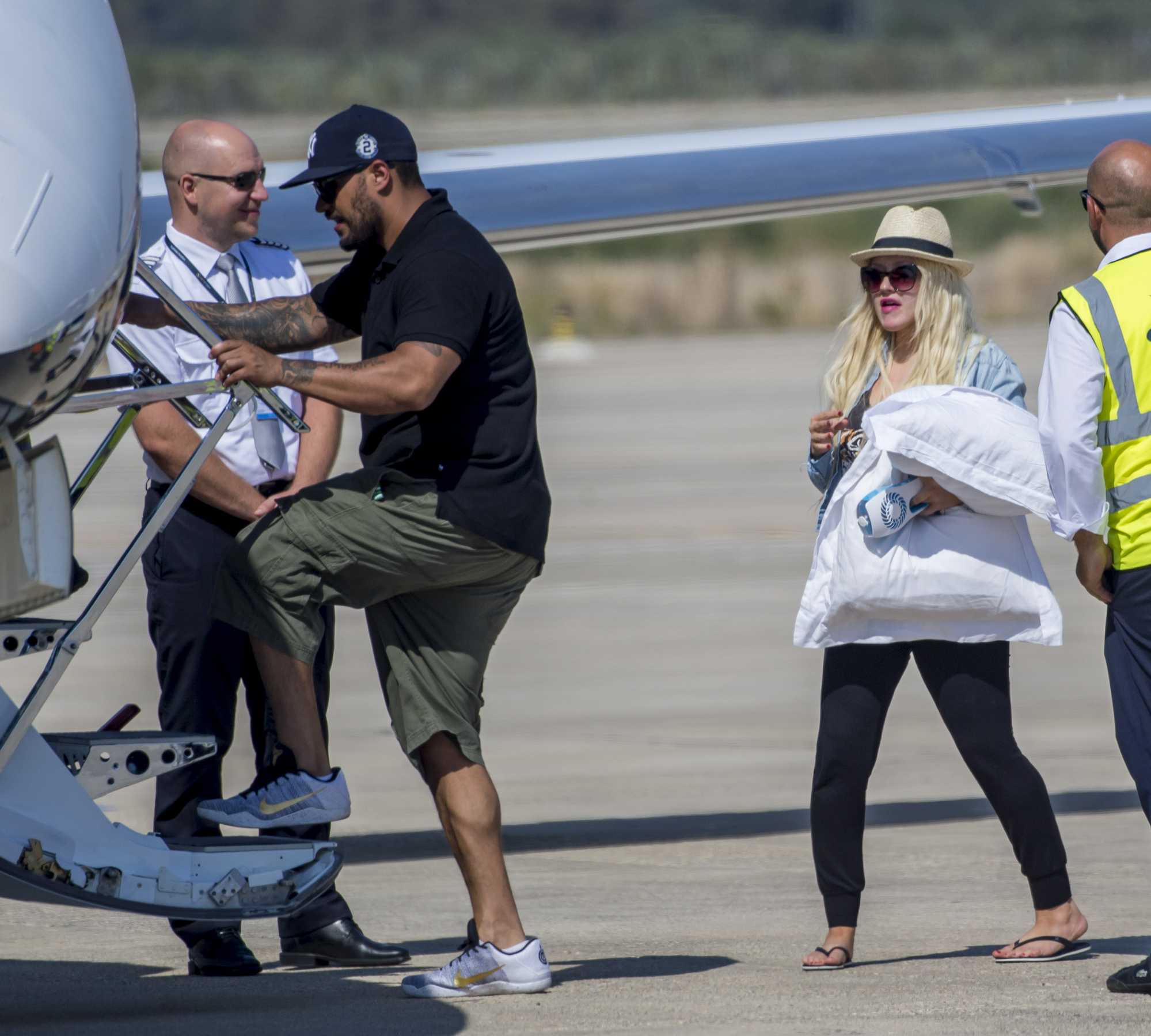 Christina_Aguilera_-_At_Paphos_Airport_in_Cyprus_on_September_7-19.jpg