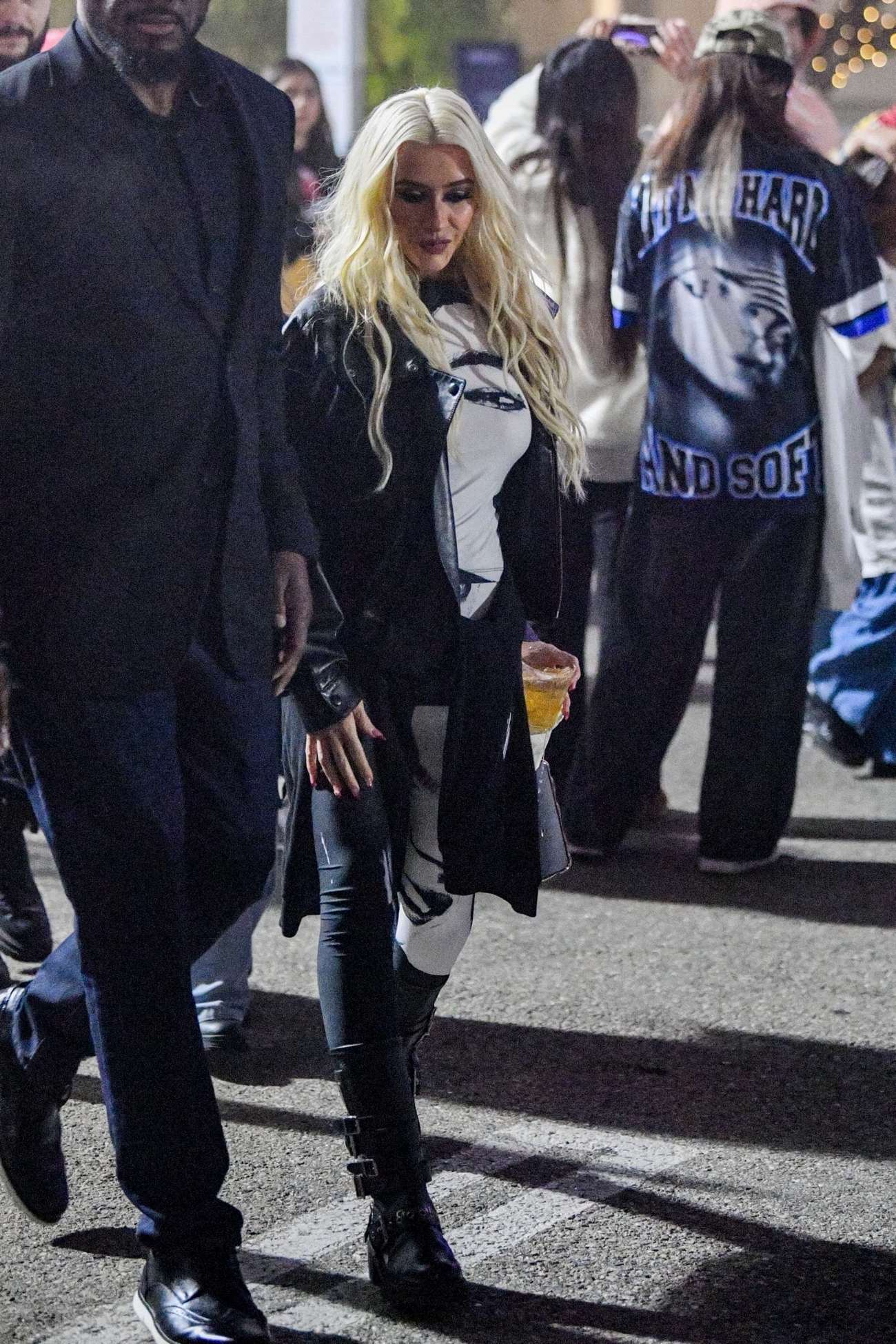 Christina_Aguilera_attending_Billie_Eilish_concert_at_the_Kia_Forum2C_Inglewood_CA_-_December_202C_2024_01.jpg